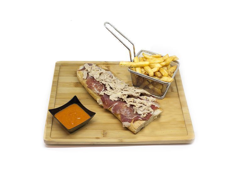 Tosta de jamón ibérico y virutas de micuit